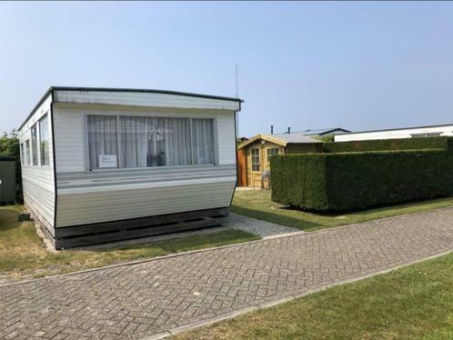 Stacaravan te huur op familiecamping in de Koog, Texel, Vakantie, Campings, Dorp, Aan zee, Internet, Kinderbed, Speeltuin, Tuin