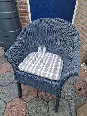 Comfortabele rotan stoel met kussen