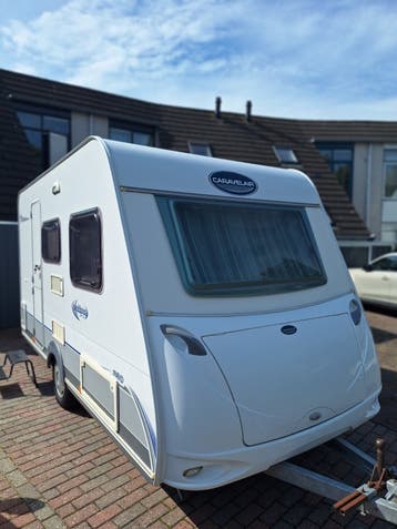Caravelair 390 Ambiance uit 2008 met TV, luifels en voortent