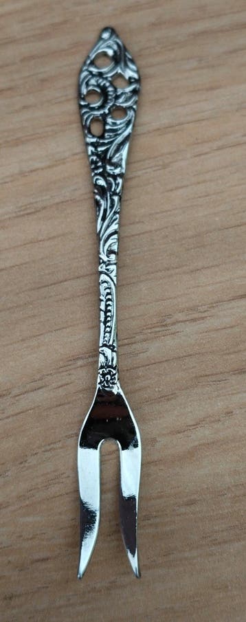 Decoratieve zilverkleurige vorkje - Antiek design