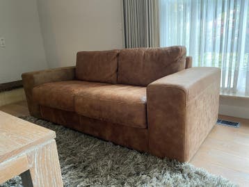 Gratis echt leren bank cognac kleur