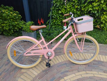Roze kinderfiets met mandje - Zo goed als nieuw - 24inch