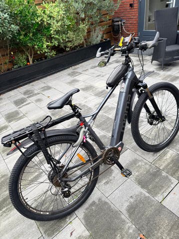 Elektrische mountainbike 29” met bagagedrager en spatborden