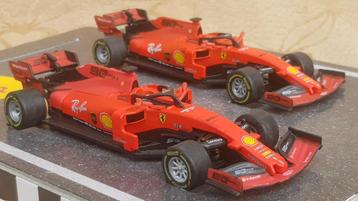 Twee Ferrari F1 telefoongestuurde schaalmodellen 1:43