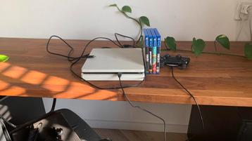 Playstation 4 Slim + spellen
