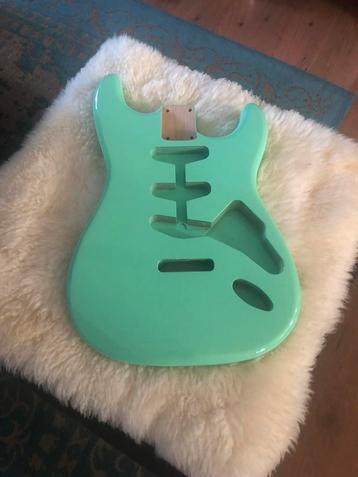 Stratocaster style body “Surf Green” polyester finish