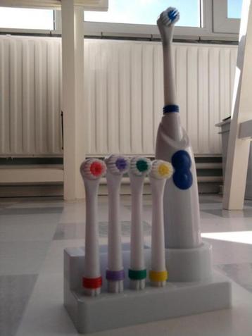 Elektrische tandenborstel met opzetborstels Tandzijde