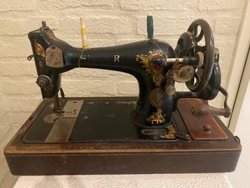 Singer hand naaimachine antiek 