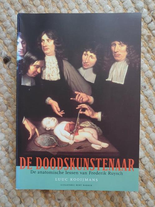 L. Kooijmans - De doodskunstenaar, Boeken, Biografieën, Zo goed als nieuw, Ophalen of Verzenden