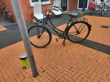 Dames fiets met voor rek en licht groningen