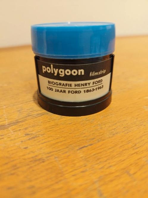 Polygoon Filmstrip 100 jaar Ford compleet incl. tekstboekje, Audio, Tv en Foto, Filmrollen, 8mm film, Ophalen of Verzenden