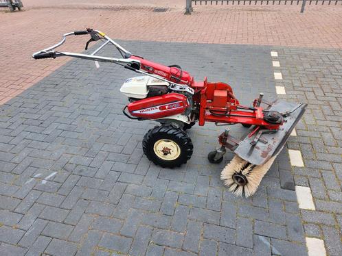 Veegmachine honda werktuigendrager Type f410, Tuin en Terras, Hand-tuingereedschap, Zo goed als nieuw, Ophalen of Verzenden