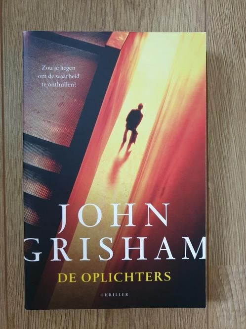 John Grisham - De Oplichters, Boeken, Thrillers, Zo goed als nieuw, Amerika, Ophalen of Verzenden