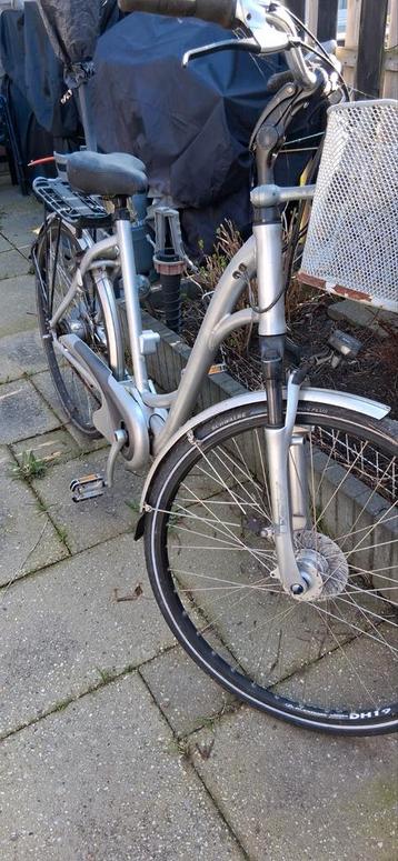 Defecte elektrische fiets met accu en oplader, gratis