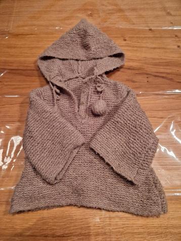 Leuke baby trui/ jas van rekbare wol. Lekker zacht! 
