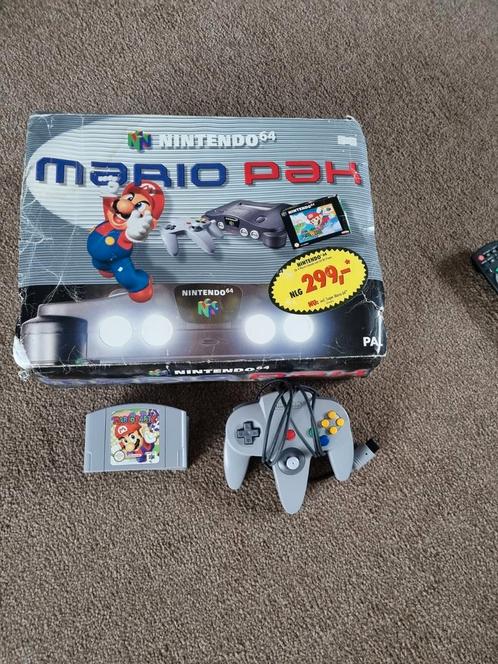 Nintendo 64 met 2 controllers en 4 spellen, Spelcomputers en Games, Spelcomputers | Nintendo 64, Zo goed als nieuw, Met 2 controllers