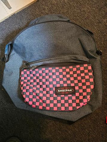 Als nieuw eastpak rugtas rugzak blauw met roze