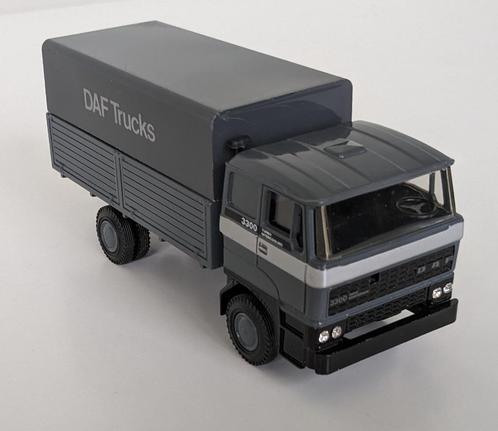 Lion Car DAF / FA 3300 DKX / uitvoering grijs., Hobby en Vrije tijd, Modelauto's | 1:50, Zo goed als nieuw, Bus of Vrachtwagen