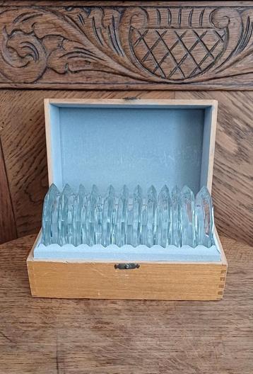 Kristallen onderzetters in houten kistje