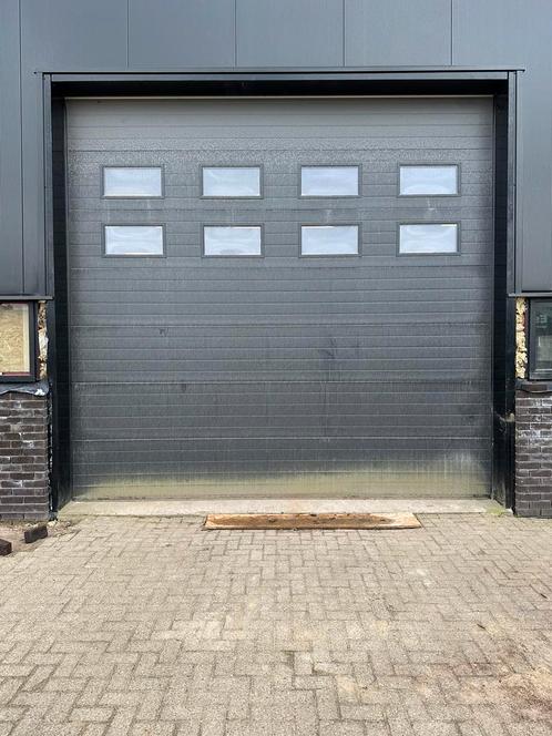 Grote elektrische roldeur  z.g.a.n. ongeveer 450x450, Doe-het-zelf en Verbouw, Deuren en Horren, Gebruikt, Garagedeur, 215 cm of meer