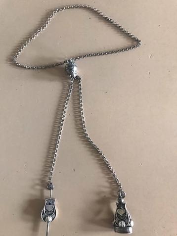Zilveren jasseron collier met tulpvormige elementen