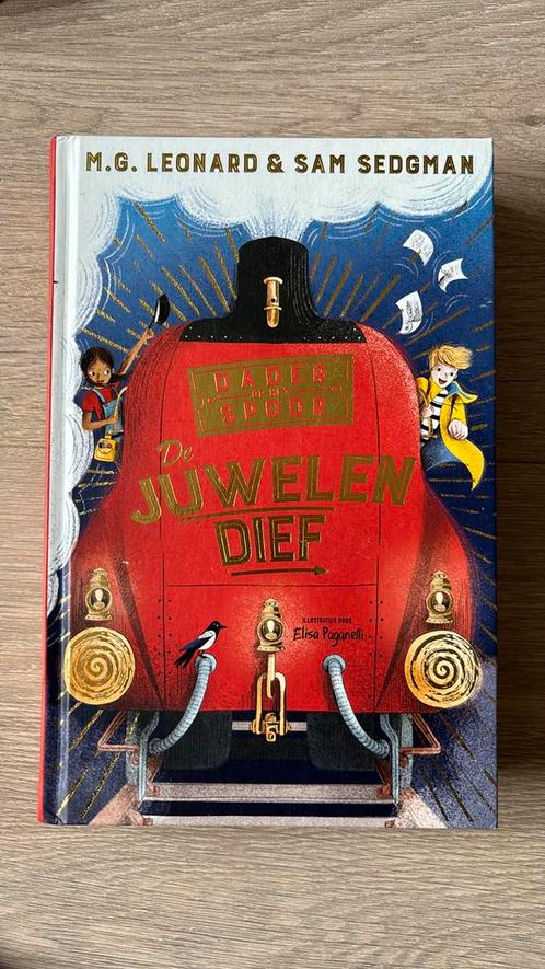 M.G. Leonard - De juwelendief, Boeken, Kinderboeken | Jeugd | onder 10 jaar, Zo goed als nieuw, Ophalen of Verzenden