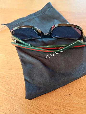 Gucci,ongedragen, nieuwe zonnebril GG0341S  001