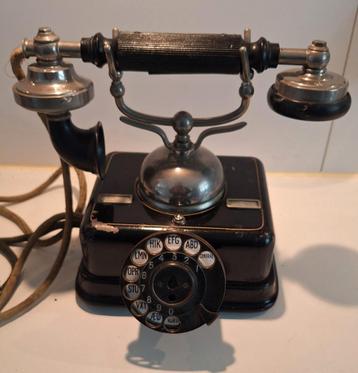 Oude antieke draai telefoon analoog 1930 zwaar 