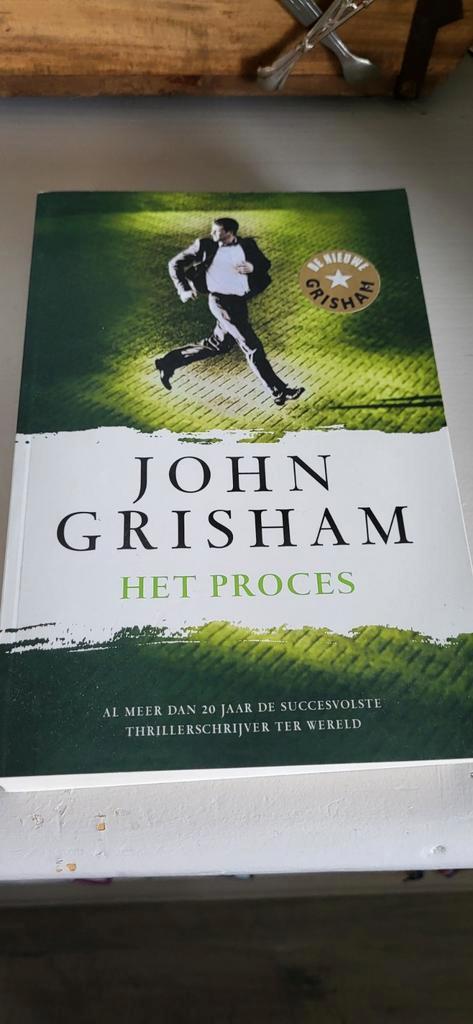 John Grisham - Het proces, Boeken, Thrillers, Zo goed als nieuw, Ophalen of Verzenden