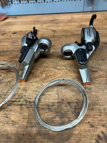 ST-M585 Shimano Deore lx shifters met remgrepen hydraulisch.