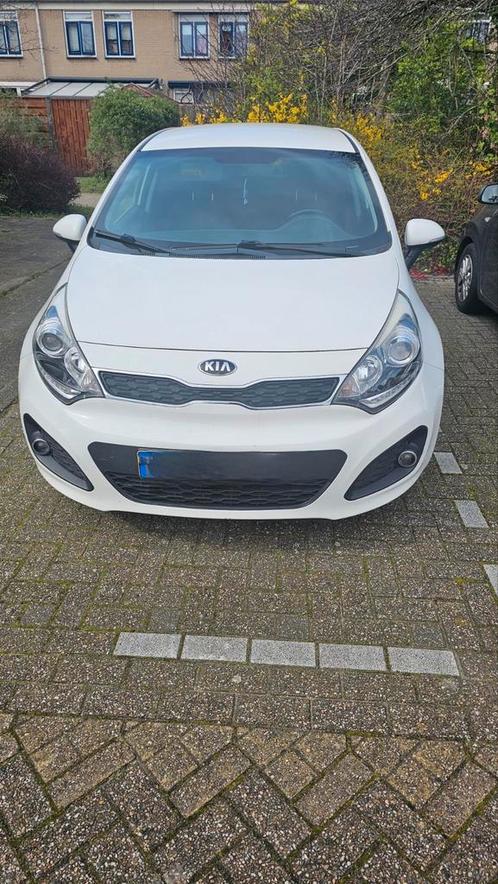 KIA RIO 1.2 I 5DRS 2014 Wit, Auto's, Kia, Particulier, Rio, ABS, Airbags, Airconditioning, Alarm, Bluetooth, Boordcomputer, Centrale vergrendeling