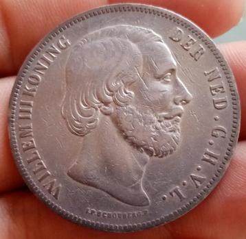 Een zilveren rijksdaalder koning Willem 3 uit 1861 schaars 