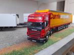 Scania met huiftrailer currie european