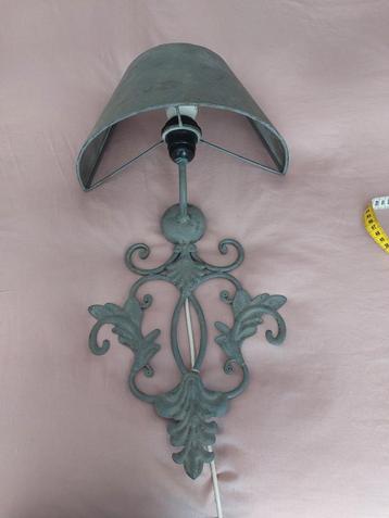 Grijze metalen wandlamp/ornament