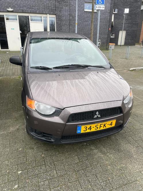 Mitsubishi Colt 1.1 5-DR 2011 Bruin, Auto's, Mitsubishi, Particulier, Colt, Airbags, Airconditioning, Centrale vergrendeling, Metallic lak