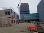 schranklader met levelbak voor  profileren zand /granulaat