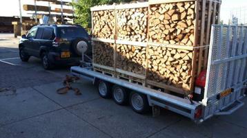 Ovengedroogd haardhout openhaardhout.  beschikbaar voor biedingen