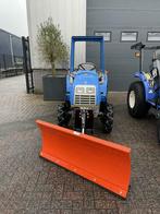 Direct sneeuw schuiven ! ? Minitractor met sneeuw schuif