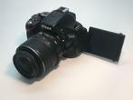 Nikon D5100 + 18-55mm VR