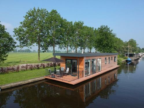 Vakantiehuis woonboot te huur in Friesland Langweer, Vakantie, Vakantiehuizen | Nederland, Friesland, Overige typen, Dorp, Aan meer of rivier