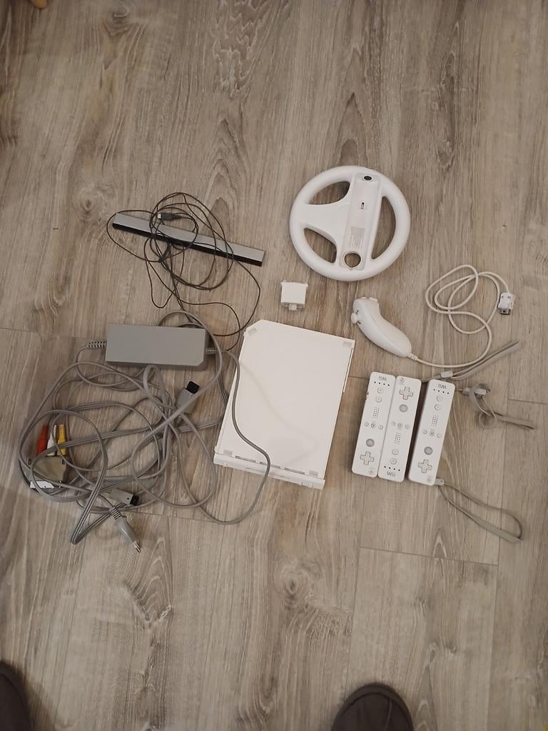 Wii spelcomputer met games en accessoires, Ophalen