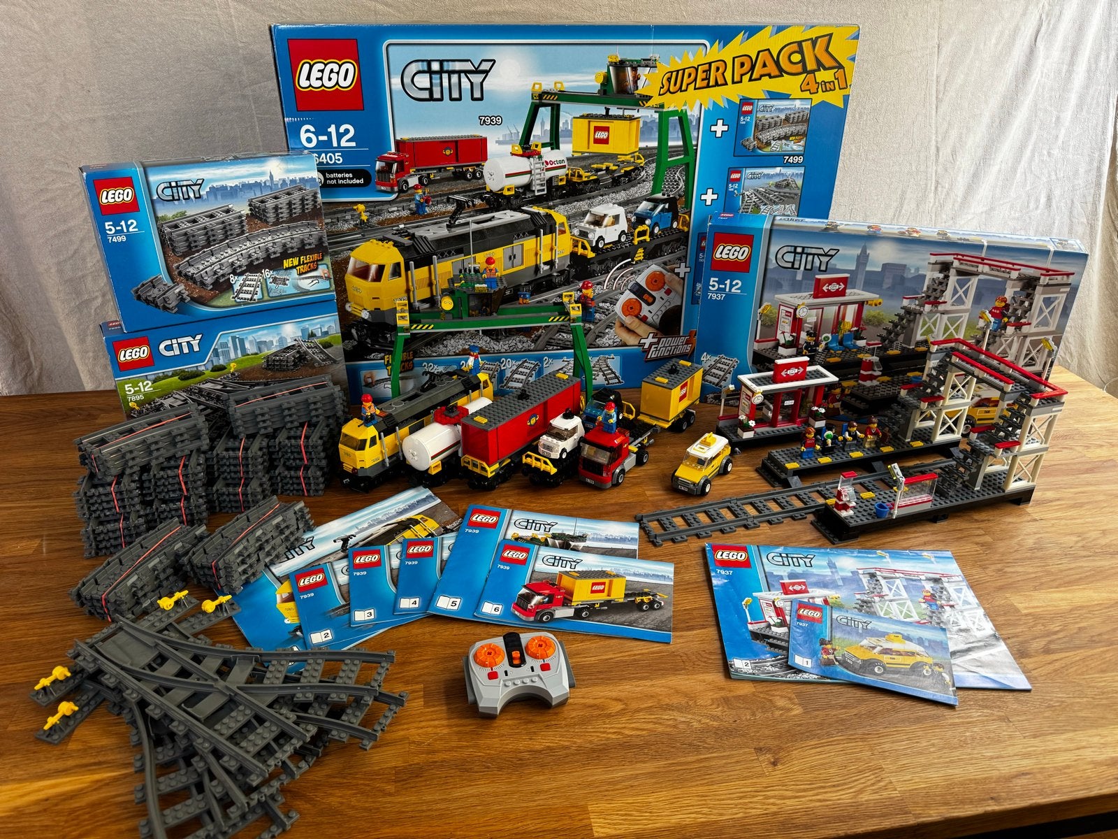 Lego City Super Pack 4in1 f66405) trein, station &veel rails, Lego, Ophalen of Verzenden, Compleet, Complete set