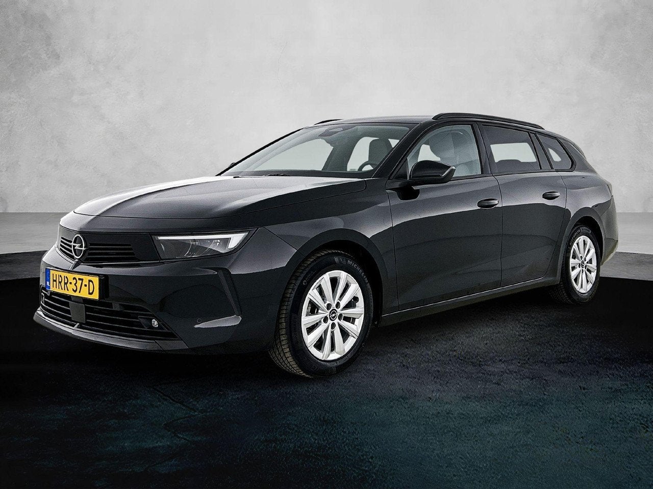 Opel Astra Sports Tourer 1.2 Business Edition 110pk | Naviga, Auto's, Opel, Gebruikt, 1199 cc, Handgeschakeld, 19 km/l
