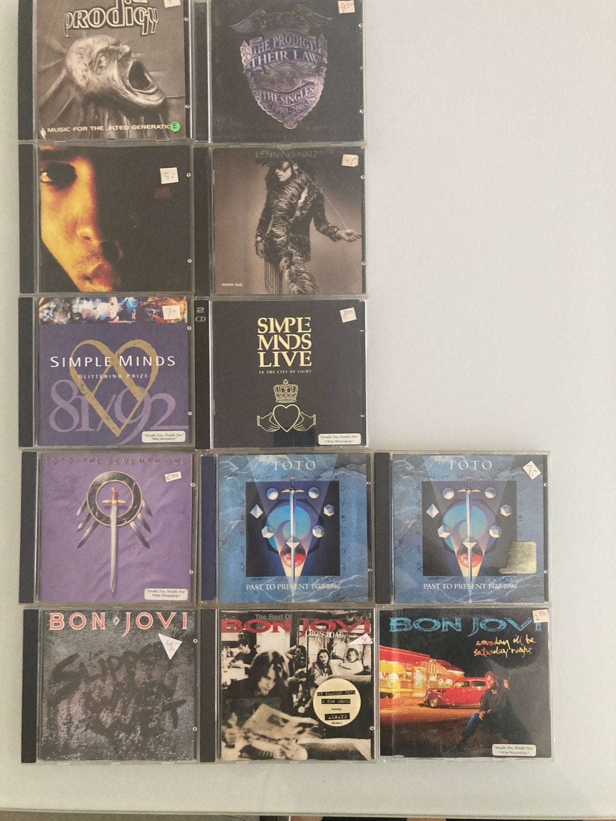 CD collectie: The Prodigy, Lenny Kravitz, Simple Minds, Toto, Ophalen of Verzenden, Gebruikt, Pop, Album