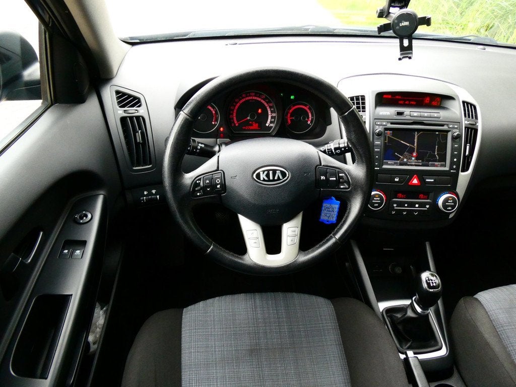 Kia Cee'd Sporty Wagon 1.4 CVVT Plus Pack Clima Cruise Navi, Voorwielaandrijving, Euro 5, Stof, 4 cilinders