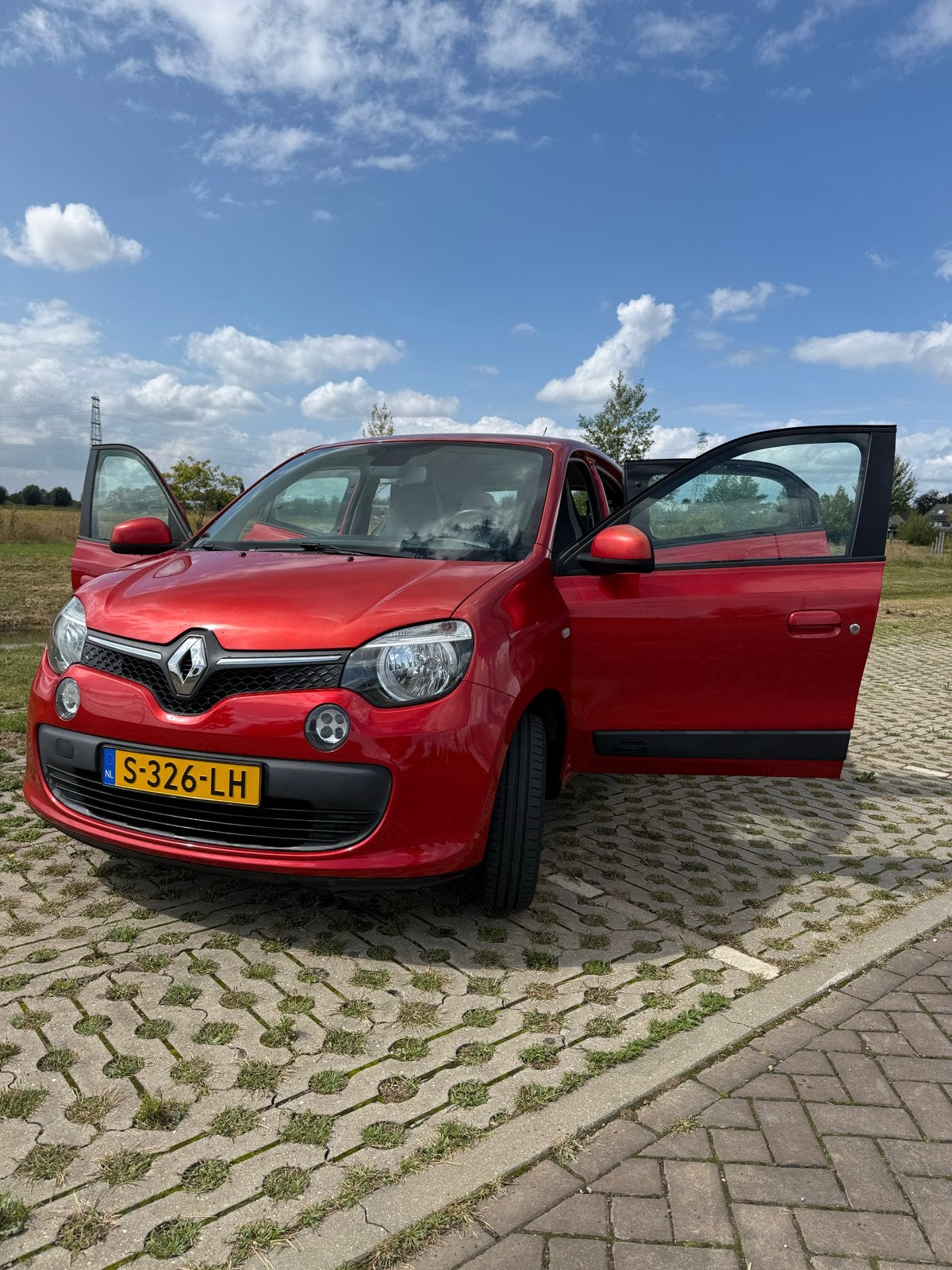 Renault Twingo 1.0 SCe 70pk S&S 2014 Rood 72000km, Auto's, Voorwielaandrijving, Twingo, 840 kg, 4 stoelen