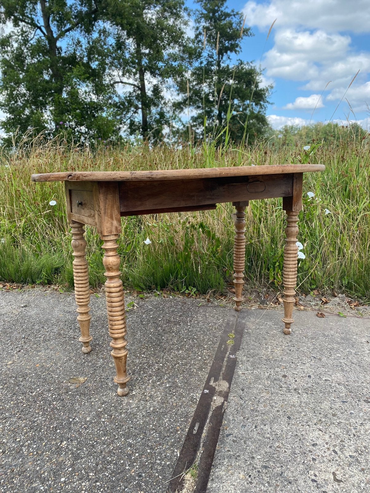 Ovale teakhouten hangoortafel, Ophalen