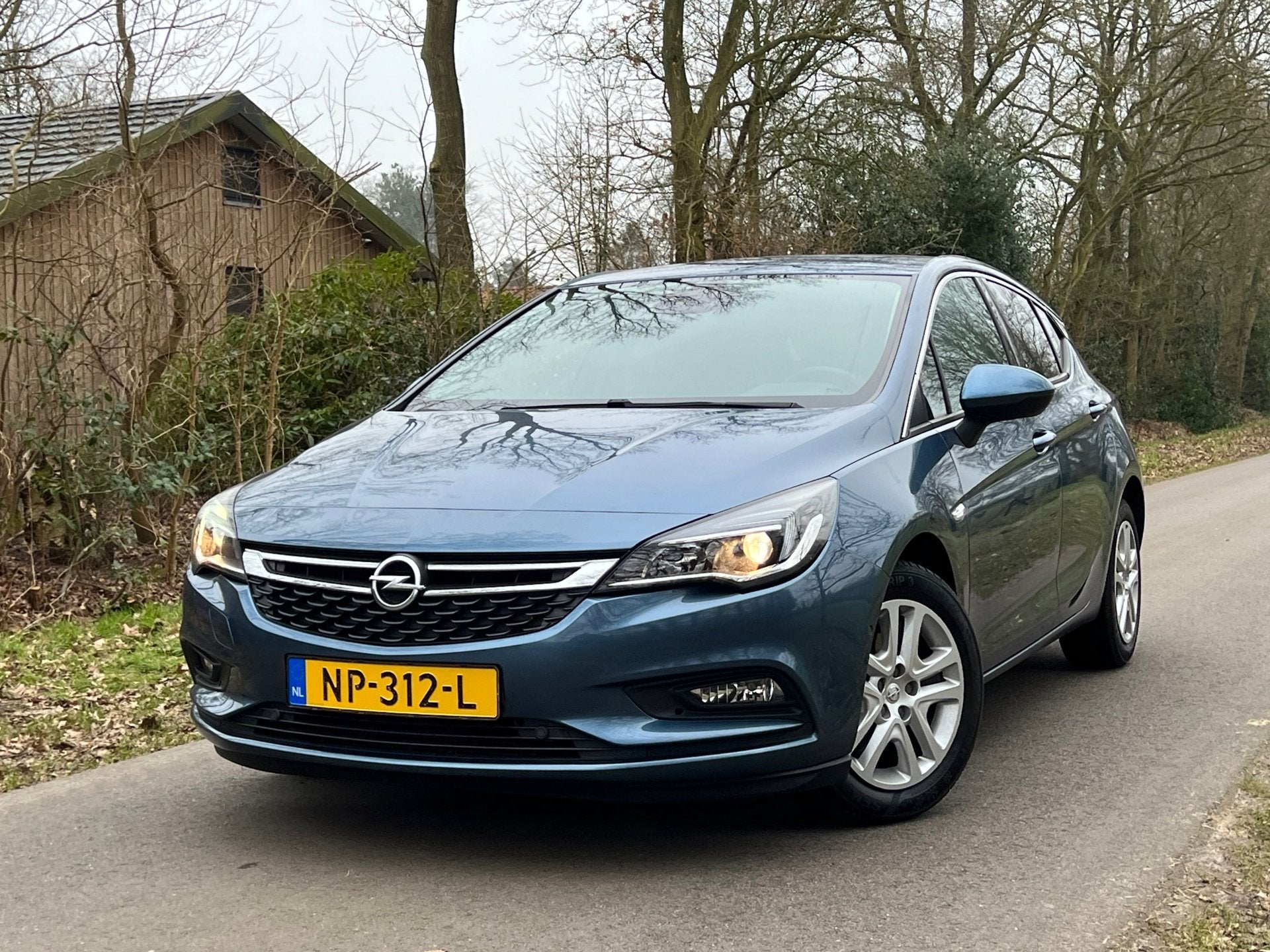 Opel Astra 1.0 Innovation | 1ste eigenaar + Dealeronderhoude, Auto's, Opel, Dealer onderhouden, Stof, Gebruikt, Blauw