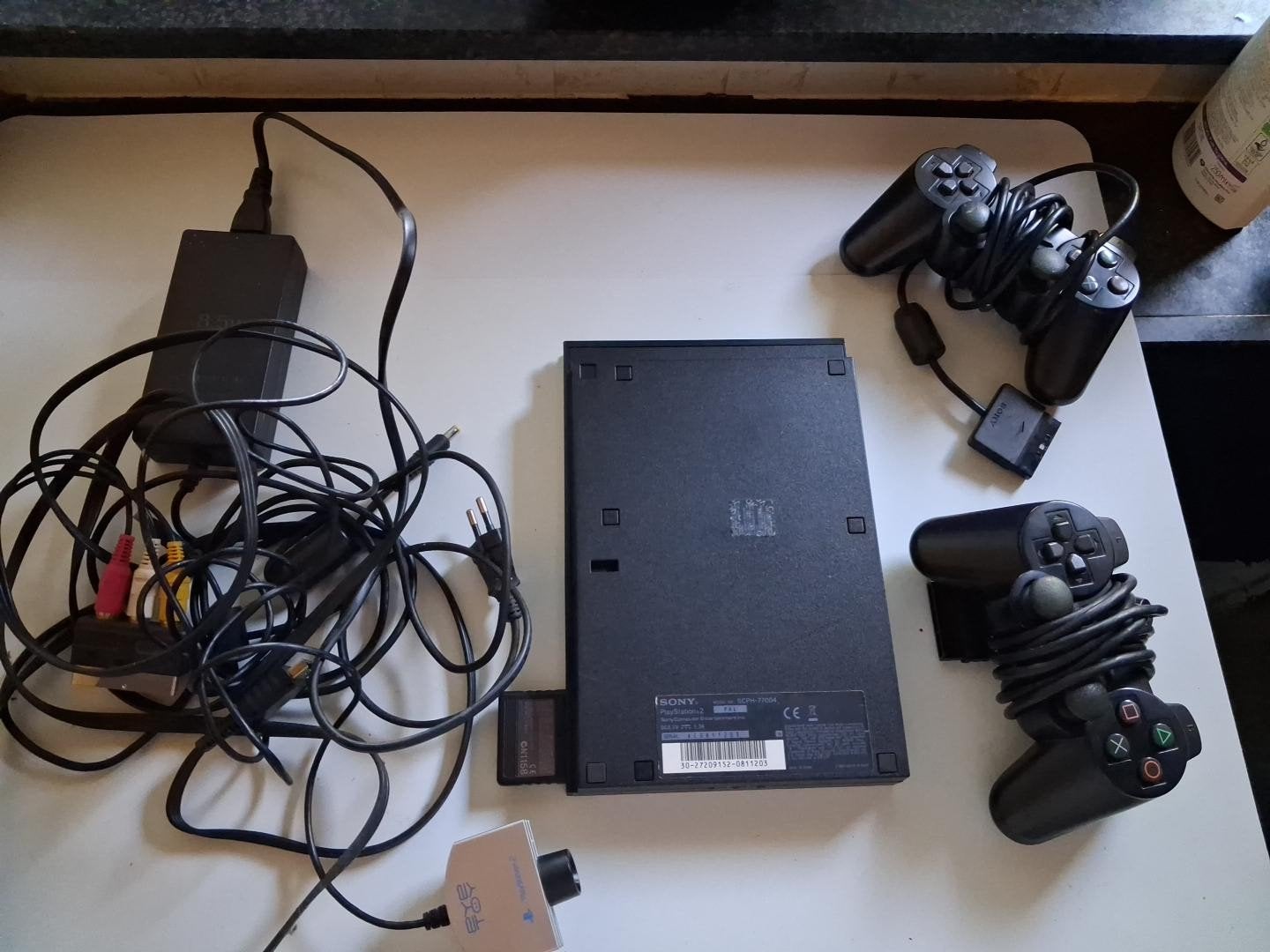 Sony PlayStation 2 Slim (PS2 Slim) incl. 7 spellen, Spelcomputers en Games, Spelcomputers | Sony PlayStation 2, Gebruikt, Zwart