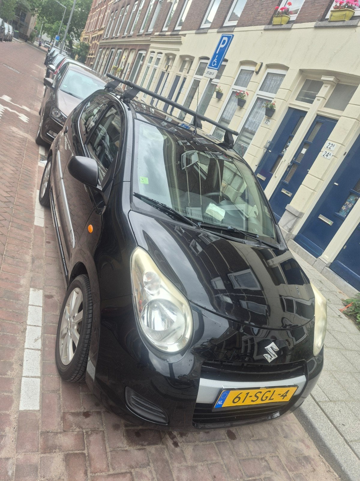 Suzuki Alto 1.0 2011 Zwart, Auto's, Voorwielaandrijving, 200 kg, 4 stoelen, Origineel Nederlands